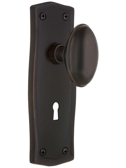 Prairie Design Mortise Lock Set With Oval Brass Knobs in Timeless Bronze.